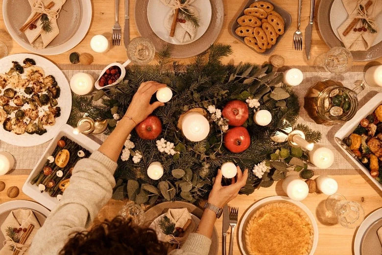 Christmas table setting with food and decorations