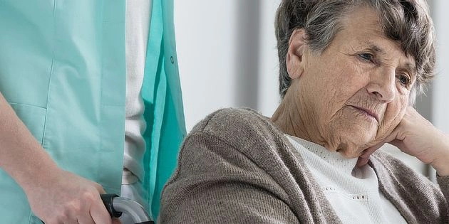 Elderly woman in care setting