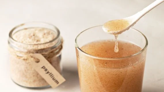 Psyllium husk in glass and jar