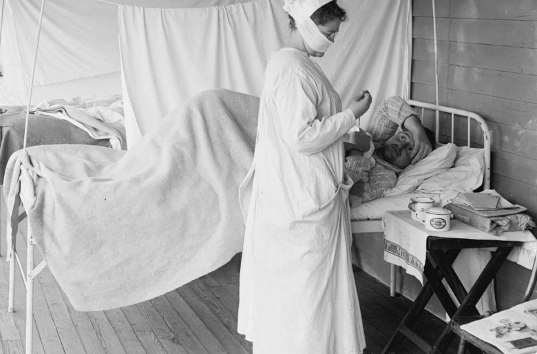 Nurse and patient in hospital tent