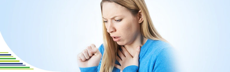 Woman coughing with hand on throat