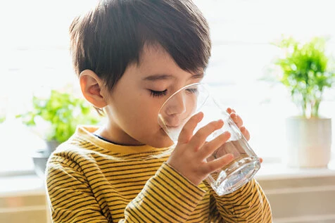 Boy drinking water