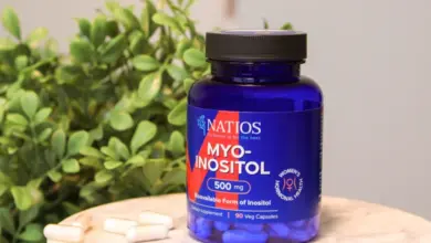 Fľaše s doplňkem stravy myoinozitolem pro ženy.