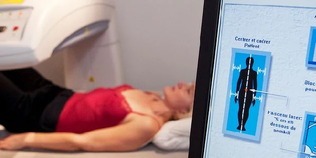 Woman on ct scanner
